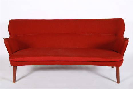 In the Manner of Kurt Olsen, Banana Sofa: In the manner of Kurt Olsen (Danish). "Banana" sofa. Upholstery, teak. c. 1960s. Height: 30 1/2", Length: 67", Depth: 30", Seat Height: 16 1/2". Red upholstered sofa in the manner of Kurt Olsen for Sl