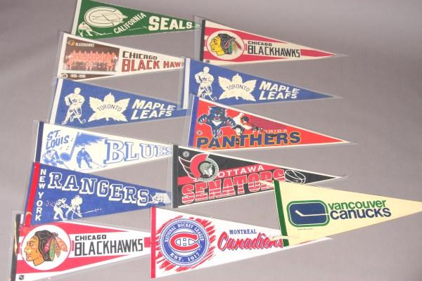 12 Hockey Pennants From 1970's to Present: Including vintage pennants from the California Seals, Vancouver Canucks, St. Louis Blues and more.