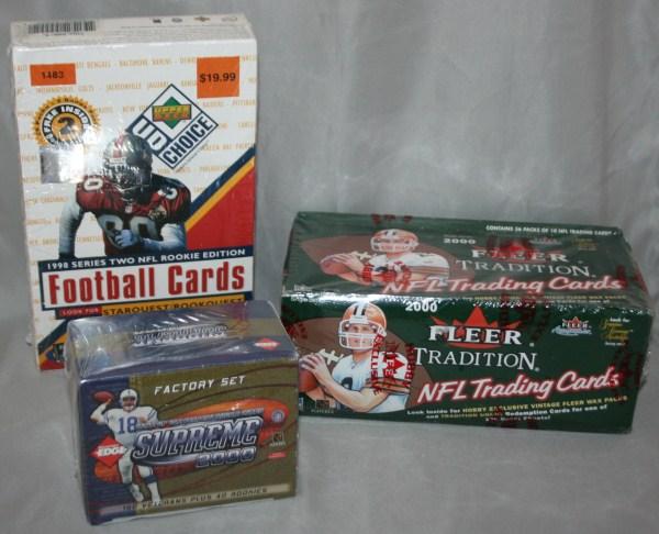 Collection of NFL Football Sports Cards of the 199: Includes: Upper Deck 1998 Series Two NFL Rookie Edition Football Cards - new still in box; Collector's Edge Supreme 2000 Factory Set - unopened in box; Fleer Autographies 2000 NFL Trading Cards - new