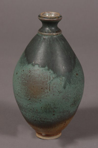 Studio Pottery Vase, Made by Chris Hosback, Signed: Ovoid form with shaded green glaze. Signed underfoot. Dimensions: H 10 1/4". Condition: Appears fine.