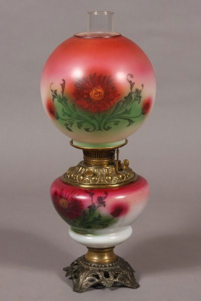 Victorian Blown Glass GWTW Oil Lamp, American, Late: Late 19th/ early 20th century. Gone with the wind lamp transfer decorated with thistles. H 19 1/2". Condition: The finish on the base is worn.