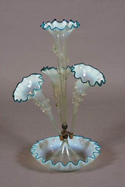 Victorian Opalescent Blue Glass Epergne, American, : Late 19th/ early 20th century. Dimensions: H 19"; D 9". Condition: Center vase with multiple air bubbles.