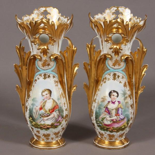 Pair Old Paris Porcelain Vases, French, Late 19th: Decorated with maidens with floral baskets and gilt highlights. H 19". Condition: Both were drilled for lamps and bases have been repaired. One with repair to side gilt foliage. Other with repair to t