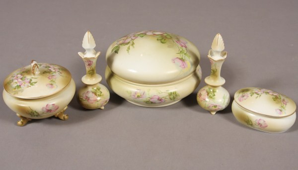 Nippon Porcelain Partial Dresser Set, Japanese, 20: 20th century. Two round covered boxed, on oval covered box and Two (2) perfume bottles. D 7". Condition: Appears fine.
