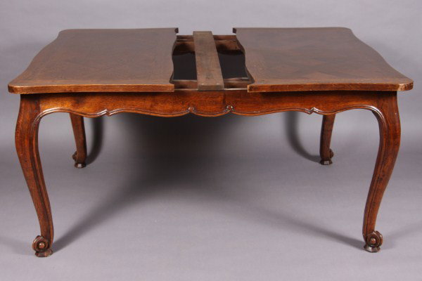 Provincial Style Oak Dining Table, French or Americ: 20th century. Parquetry top on cabriole legs. H 28 1/2"; W 48"; D 43". Condition: With One (1) leaf (not pictured).