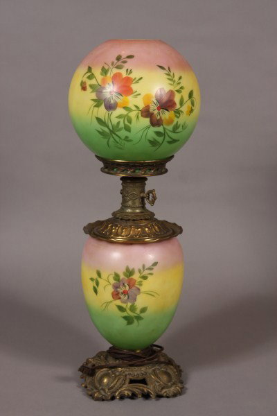 Victorian Blown Glass GWTW Oil Lamp, American, 20t: Gone with the wind lamp painted with floral blossoms. H 26". Condition: Electrified. The finish on brass is worn.