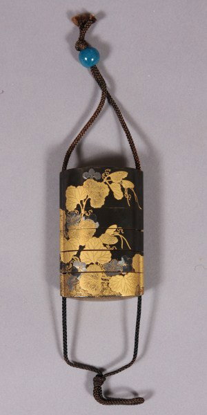 Lacquered Six Case Inro, Japanese, 20th c., Gilt a: Japanese, 20th c., Gilt and Abalone, decorated with foliage. H: 3/4". Condition: Missing Three (3) pieces of abalone, gilt is worn along edges.