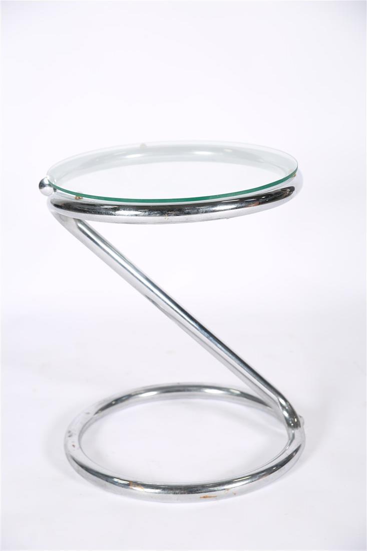 Chrome and Glass Tubular Side Table: Chrome, glass. Height: 19 1/2", Diameter: 16 1/2". Glass top chrome tube side table. Appears unmarked.