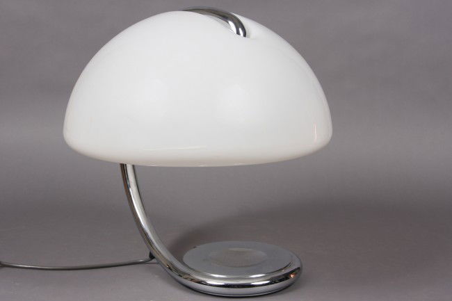 Elio Martinelli, "Serpente" Table Lamp, Italian, 20: 20th century. Manufactured by Martinelli Luce. Chrome body with domed plastic shade. H 17". Condition: Minor yellowing on the shade.