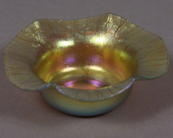 Steuben Gold Aurene Salt Cellar with Flaring Ruffl: With flaring ruffled rim, American, Carder period, 1903-1932. H 13/16"; D 3 3/4".