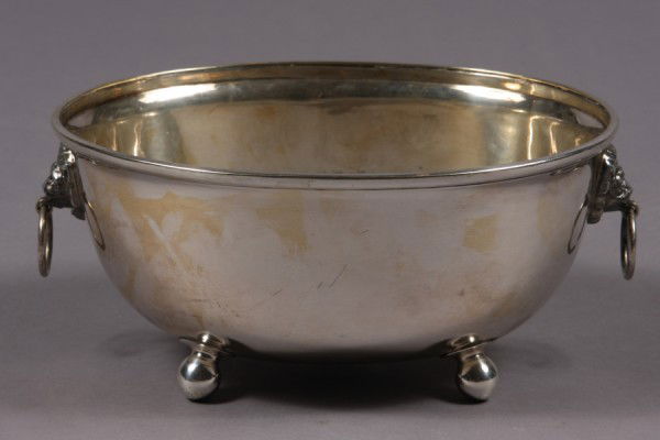 Silver on Copper Oval Footed Bowl: Silver on Copper Oval Footed Bowl. English, 20th Century. L: 10"Condition: The silver plate is worn through on the interior bottom of the bowl.