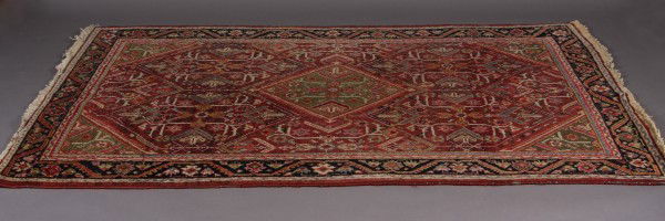 Hamadan Rug: Hamadan Rug. Iranian, 20th Century. Center green diamond against a rust and foliate ground. 7'x 4' 4"Condtion: The fringe is frayed.