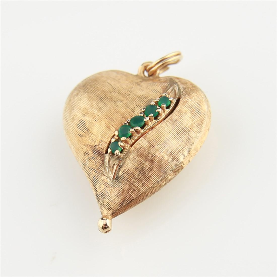 14k Yellow Gold, Emerald Heart Pendant: 14k yellow gold heart-shaped pendant with five small emeralds. Appears unmarked. 1" x 1 1/4". 7.1g.