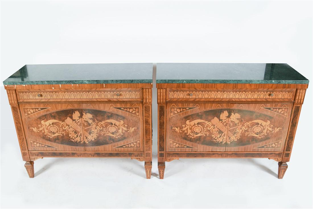 Pair of Marquetry Marble-Top Commodes: Carved wood, marquetry, marble. Height: 39 1/4", Length: 48", Depth: 19 1/4". Pair of marquetry buffets with two doors and one drawer. Made in Spain, "Pico Muebles" label to the bottom.