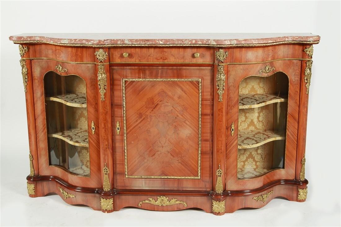 Fratelli Cattaneo, Marquetry Buffet: Carved wood, veneer, marble. Height: 43", Length: 76 1/4", Depth: 18 3/4". Large marquetry buffet with two glass doors and one center door. Made in Italy by Fratelli Cattaneo. Label to the reverse. Ce