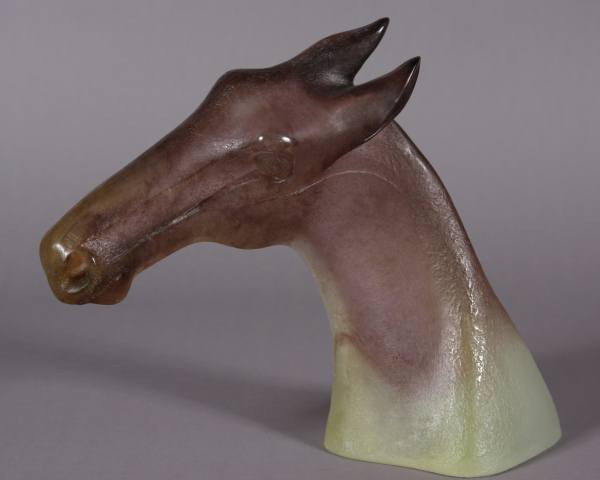 Daum Art Pate de Verre Glass Bust of a Horse Head: Daum bust of a horse head. Designed by Claude L'Hoste. Pate de verre glass, H: 15 1/2", W: 14". Signed "L' Hoste" and "Daum". Condition: Appears fine.