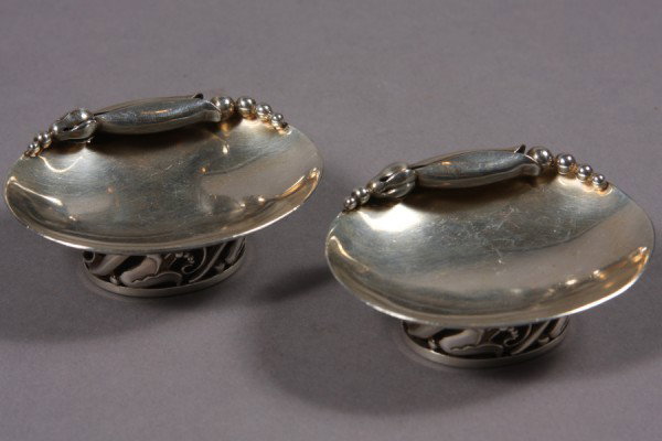 Pair Georg Jensen Small Dishes, 5 Troy Ounces: Pair Georg Jensen small dishes. Sterling silver, H: 1 1/8", L: 3". 5 troy ounces. Made by LaPaglia for Georg Jensen. Danish/American, Mid- 20th Century. Marked 'Georg Jensen, Inc. U.S.A. L.P." Numbere