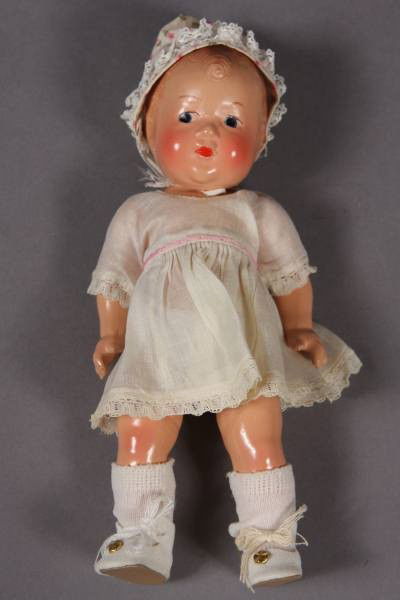Effanbee Composition Patsy Jr. Doll: Effanbee composition Patsy Jr. doll. 20th Century. H: 11". Condition: The side of the head is cracked.