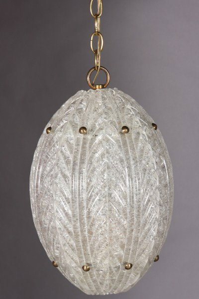 Mid-Century Mottled Glass Light Fixture, Italian : Mid-Century ovoid hanging light fixture. Italian, 20th Century. Mottled glass, globe H: 15 1/2". Condition: The seams are joined with filler. It appears one panel has a small chip toward the bottom.