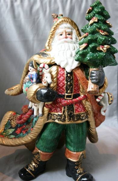 Fitz & Floyd Santa Figurine, Having Green Woodland: Fitz & Floyd Santa Figurine, Having Green Woodland Jacket and Christmas Tree. Holding bag and Christmas gifts. #201. Condition: Appears fine.