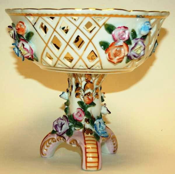 KPM Gilded Ceramic Basket on Pedestal with Applied: KPM Gilded Ceramic Basket on Pedestal with Applied Roses, New in Box. #331B. Condition: Appears fine.
