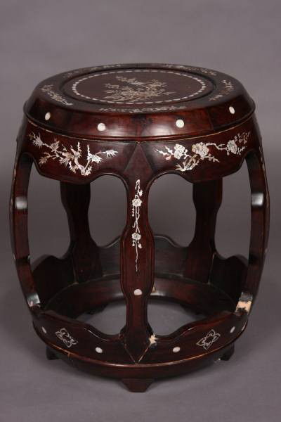 Hardwood and Abalone Floral Inlaid Taboret, Chinese: Hardwood and abalone inlaid taboret. Chinese, 20th Century. With floral inlay. H: 17 1/2", D: 14 1/2". Condition: The seams are separating on the base. Two seams are chipped and have been repaired wit