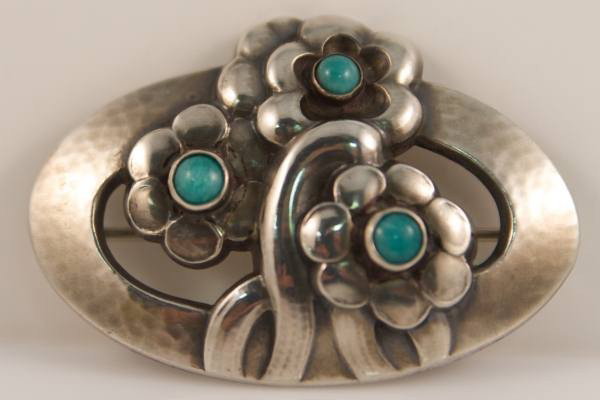 Sterling Silver Broach & Earrings, George Jensen: Georg Jensen broach and screw back earrings set. Sterling silver with green hard stone accents. Each marked and numbered. Broach marked "28". Earrings marked "36". Broach L: 2", W: 1 5/16". 0.405 troy