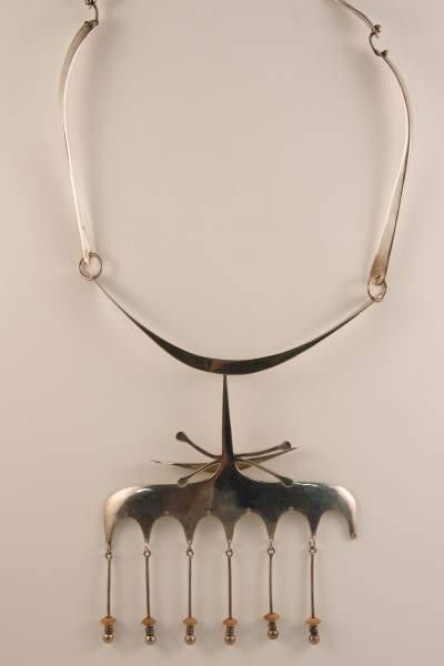 Mid-Century Modern Necklace, David Anderson: Mid-Century Modern Necklace. Sterling Silver. Marked. Stamped with "Sterling" on clasp and pendant and marked with "A" inside fish design. 1.98 troy ounces. 61.6 grams. Condition: Missing one dangle.