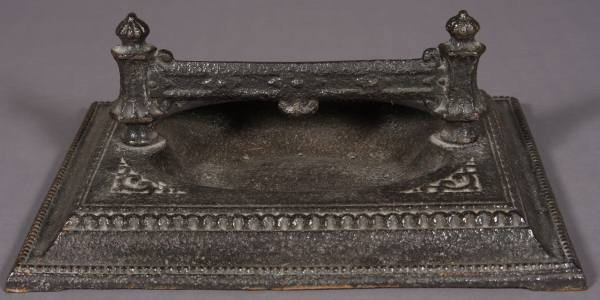 Victorian Style Cast Iron Boot Scraper, 20th C.: Victorian style cast iron boot scraper. 20th Century. H: 6 1/2", W: 17", D: 12 1/2". Condition: Appears fine.