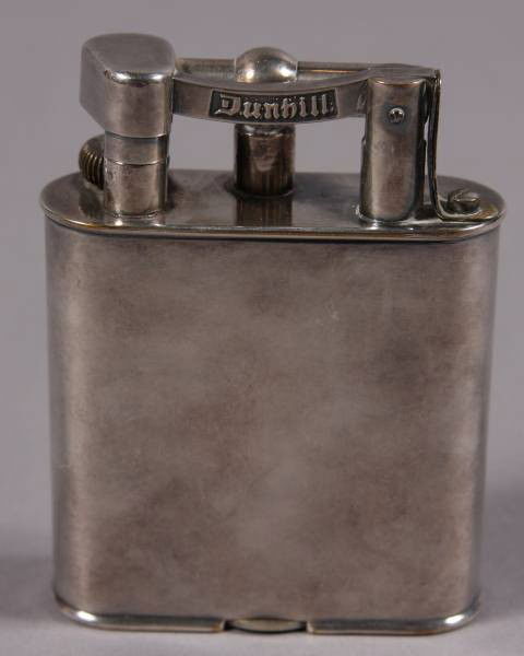 Dunhill Chrome Oversized Lighter, English, 20th C.: Dunhill chrome oversized lighter. English, 20th Century. H: 4 1/4". Condition: Appears fine.