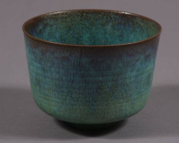 Otto Natzler Earthenware Mottled Blue Bowl: Otto Natzler earthenware mottled blue glazed cylindrical bowl. American, third quarter 20th Century. Signed "Natzler". H: 5 1/8", D: 7". Condition: Broken and repaired.