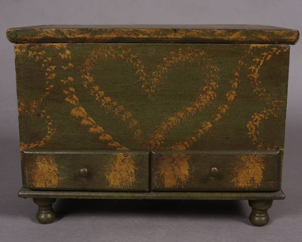 Grain Painted Miniature Blanket Chest, 19th Century: Grain painted miniature blanket chest. American, 19th century. With later green sponge painted decoration. With hinged top and two lower drawers, on turned feet. Height 10 ¼", width 13 ¾", depth 8 �