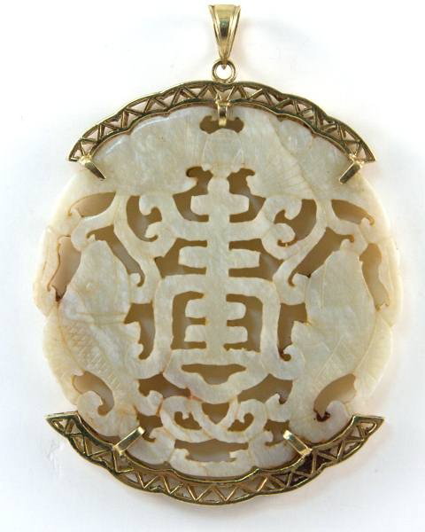 Pendant, Hand Carved Soapstone With 14K Yellow Gold: Pendant made of hand carved soapstone with 14k yellow gold accents. Pendant hallmarked and stamped with "14K". Length 2 1/2", width 2".