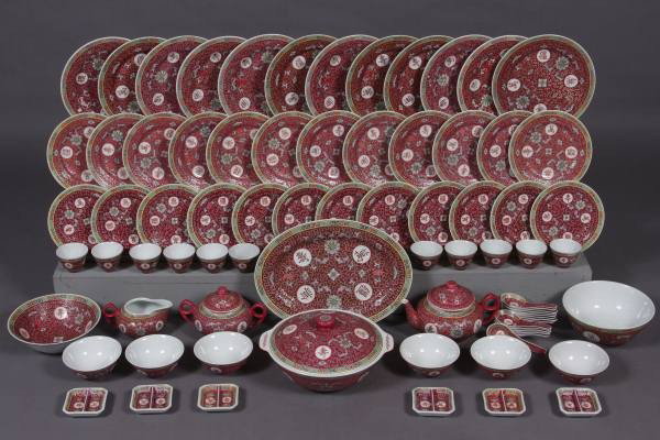 Porcelain Dinner Service, Chinese, 20th Century: Porcelain dinner service. Chinese, 20th century. With foliate motif against a rose ground. Including: twelve dinner plates, twelve luncheon plates, twelve dessert plates, five soup bowls, eleven tea b