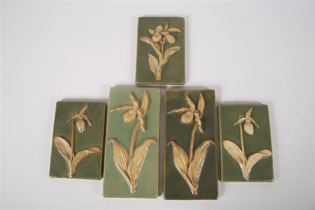 Weaver Tile, Scott Weaver, Collection of 5 Tiles: Scott Weaver (American, 21st century). Ceramic, 2001, 2009, 2010, 2013. Weaver Tile. Largest: Height: 8 1/4", Length: 4". Smallest: Height: 5 7/8", Length: 4". Four tiles with earth tone lady slipper/