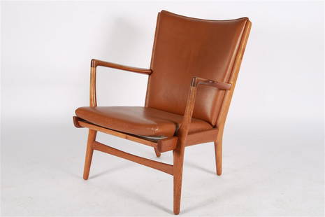 Hans Wegner, AP16 Brown Leather Chair: Hans J. Wegner (Danish, 1914-2007). AP-16 chair. Teak, leather. AP Stolen. Height: 32 1/2", Length: 27 1/2", Depth: 30". Brown leather upholstered teak armchair designed by Hans J. Wegner. Danish Cont