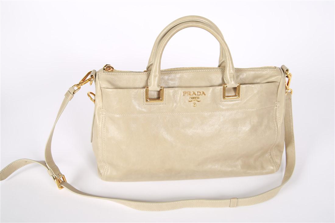 Prada, Coloniale Bauletto Calfskin Bag: Prada (Italian, established 1913). Coloniale Bauletto Calfskin Bag. Style: BLO792. Calfskin leather, yellow colored metal. Height: 9 1/2", Length: 15", Depth: 5 1/4". Calfskin leather Bauletto bag by