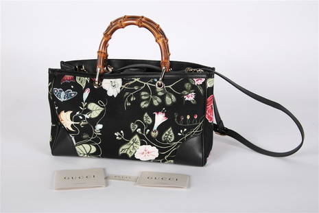 Gucci, Kris Knight Flora Tote Shopper Bag: Gucci (Italian, established 1921). Flora Tote Shopper Bag. Canvas, leather, bamboo handles. In collaboration with Kris Knight. Height: 8", Length: 13", Depth: 5". Floral print canvas tote bag by Gucci