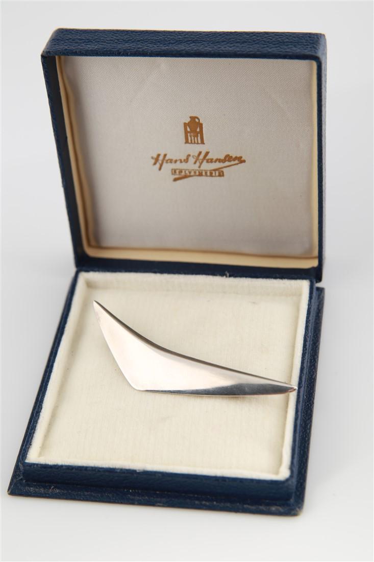 Bent Gabrielsen for Hans Hansen, Boomerang Brooch: Bent Gabrielsen (Danish, 1928-2014). Sterling silver. Model 113. Designed for Hans Hansen. 3/4" x 3". Weight: 0.390 ozt. Abstract boomerang shaped sterling silver brooch designed by Bent Gabrielsen fo