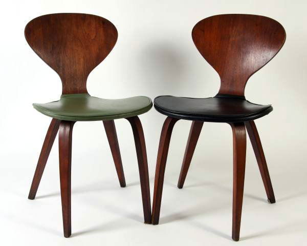 Pair Norman Cherner Plycraft Ant Chairs: Pair Plycraft laminated wood Ant chairs. American, 20th century. Designed by Norman Cherner. One with black leather seat and the other with green leather seat.
