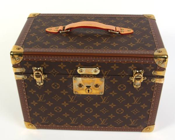 Louis Vuitton "Boite Pharmacie" Toiletry Case: Louis Vuitton "Boite Pharmacie" trunk made of monogrammed canvas with natural leather and golden brass accents. Includes removable smaller mirrored box. Secured with an "S-Lock" with key and two trunk