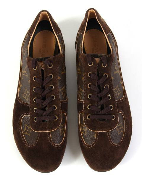 Women's Louis Vuitton "Energie" Sneakers: Women's Louis Vuitton "Energie" monogram canvas and suede sneakers. Size 41. With "Louie Vuitton" signature logo stitched on heels and "Louie Vuitton" leather logo stitched on tongue. Lined leather up