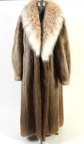 Women's Blonde Sheared Beaver Coat With Lynx Trim: A women's coat made of natural blonde sheared beaver fur. 20th century. Having lynx fur trim. 7/8 length. Women's size large, 12-16.