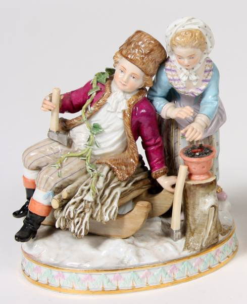 Meissen Porcelain Figural Group, German, 20th C.: Meissen porcelain figural group. German, 20th century. Depicting a young man and maiden with a sled warming their hands. Height 5 1/2", width 5".