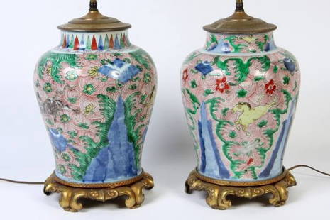 Pair of Porcelain Foliate Decorated Urns: Pair of porcelain foliate decorated urns. Chinese, 19th century. Fitted as table lamps. Height 12", width 9". Provenance: From The Estate of Esther Gordy Edwards, Detroit, Michigan. Edwards was the fo