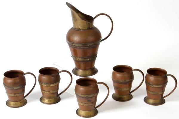 Hector Aguilar Copper Lemonade Set, Mexican: Hector Aguilar copper lemonade set. Mexican, 20th century. Including a pitcher and fire mugs. Pitcher height 12 1/4".