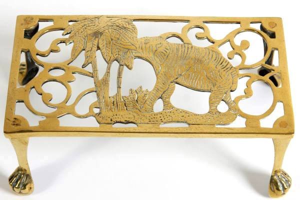 Georgian Style Brass Fireplace Trivet, 20th C.: Georgian style brass fireplace trivet. 20th century. Height 3 1/2", width 9 3/4", depth 5 1/2".