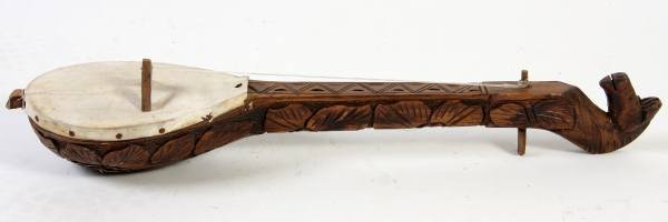 Two Decorative Banjoes, Probably Mexican: A decorative banjo made of carved hardwood with rawhide string and bowl covering. Probably Mexican, probably 20th century. Neck carved with horse form finial, bowl back carved with floral design. Leng