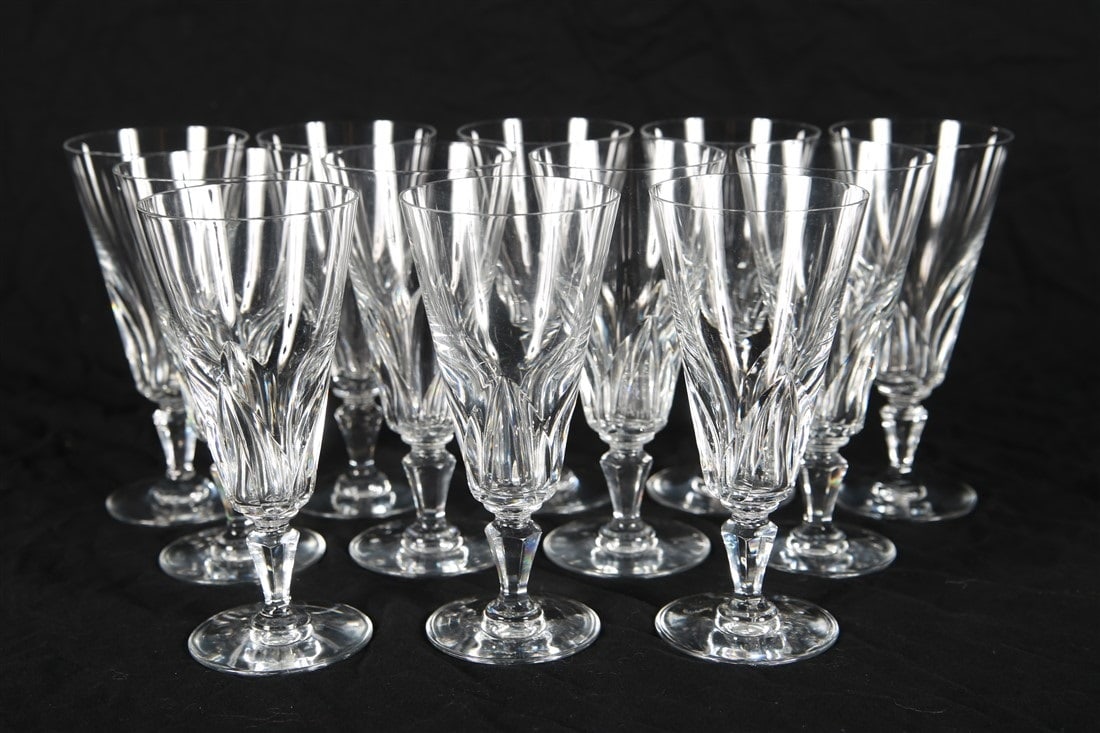 Baccarat, Twelve "Chartres" Fluted Champagne Glass: Baccarat (French, established 1764). "Chartres" fluted champagne glasses. Crystal. Height: 6 1/8", Diameter: 2 3/4" ea. Set of twelve Baccarat fluted champagne glasses in the "Chartres" pattern. All m
