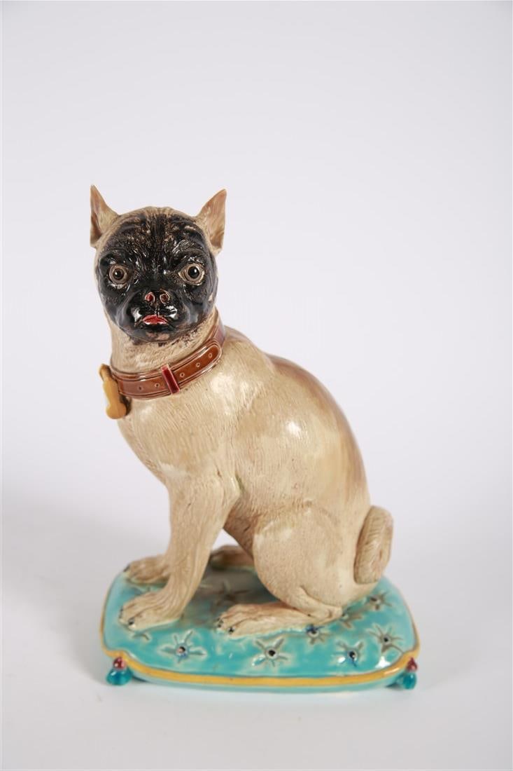 J. Holdcroft, Majolica Seated Dog: Joseph Holdcroft and Company (English, 19th century). Glazed ceramic, 1875. Height: 11", Length: 7 1/2", Depth: 4 1/2". Majolica boxer or pug dog seated on a tasseled cushion. Marked to the underside 